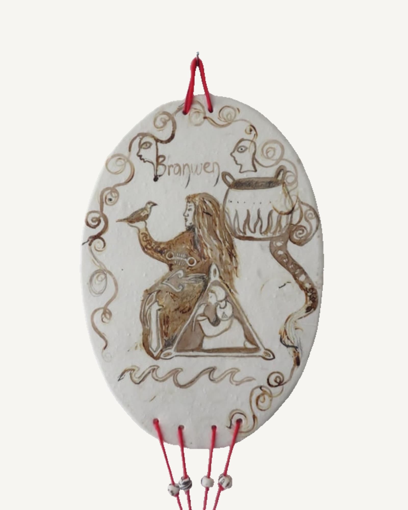 Branwen, an oval porcelain wall piece hung on red Welsh wool