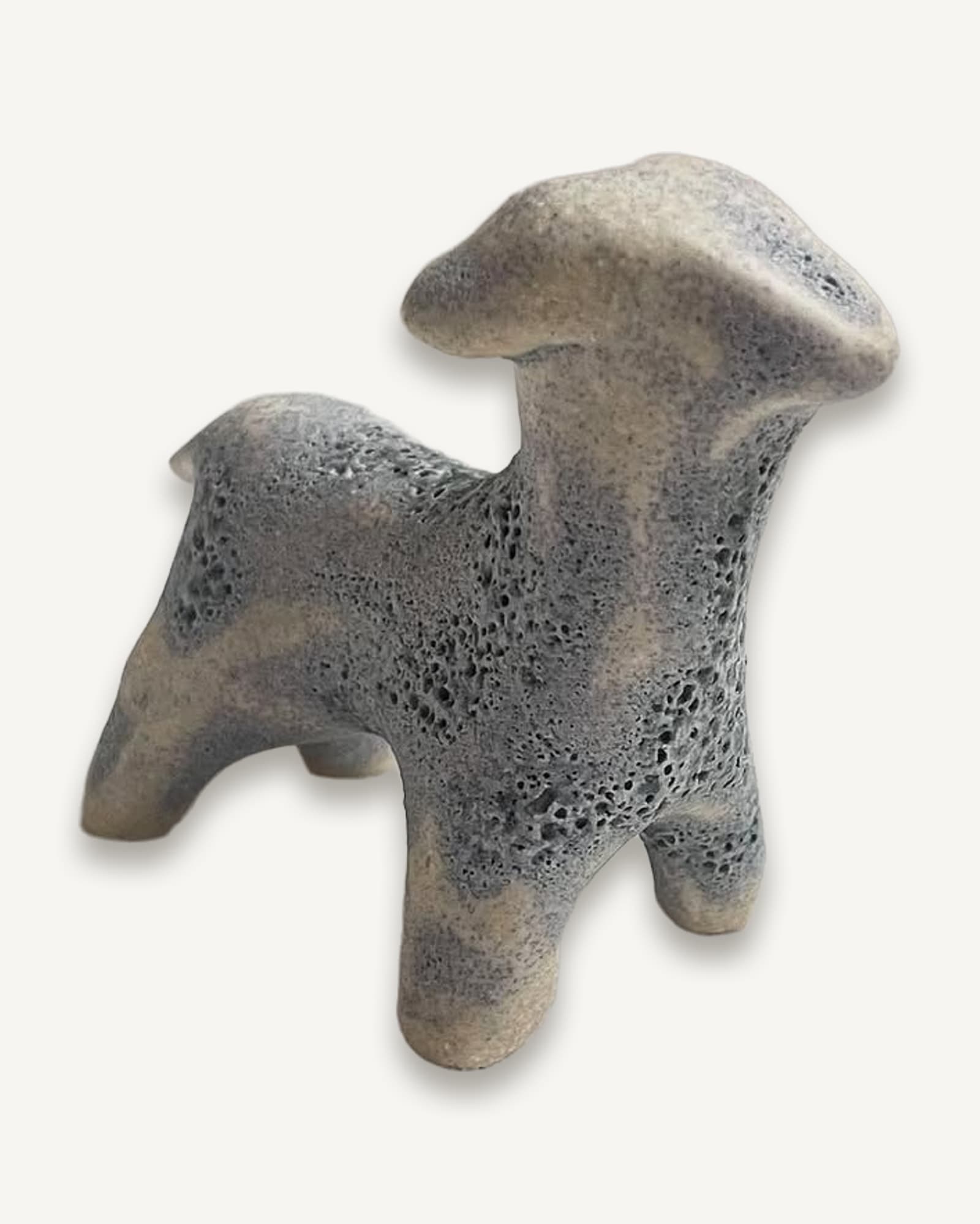 Ceramic lamb figurine with porous lava glaze, pale grey with dark pitting
