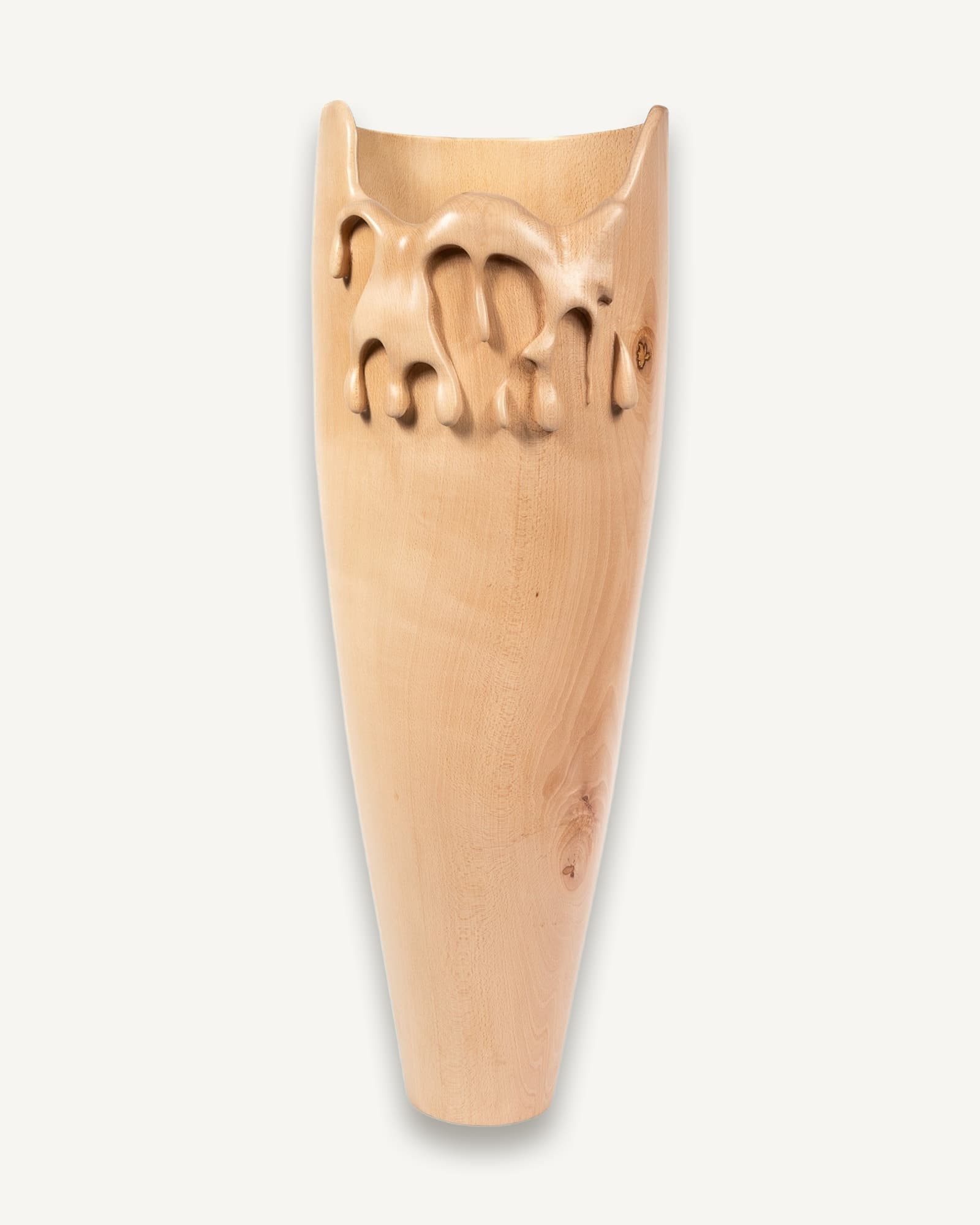 Tall natural beech vessel with slumped, melting rim and carved organic forms cascading down the top edge.