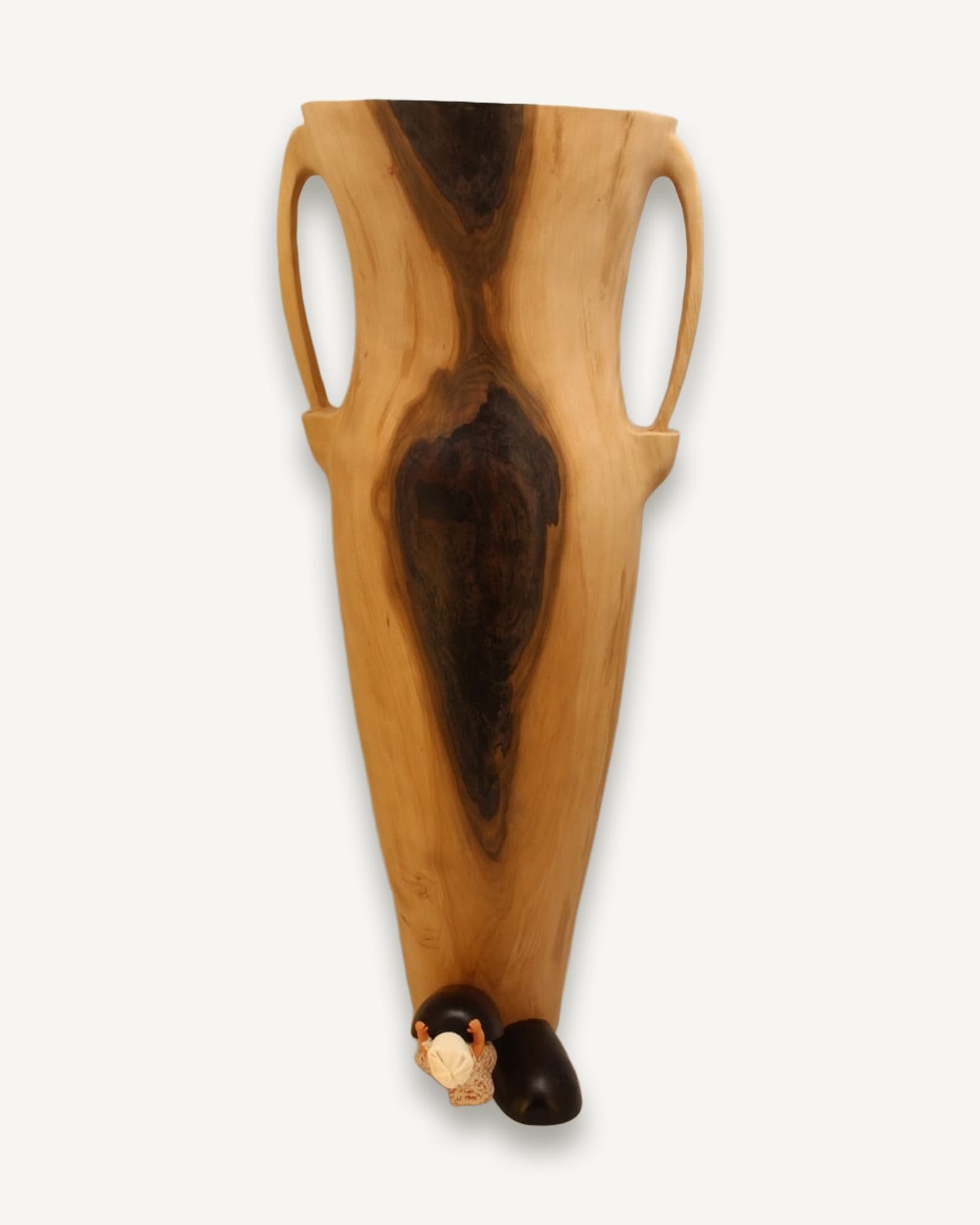 Tall beech vessel with two curved handles, light wood grain with dramatic black rot seam running lengthwise