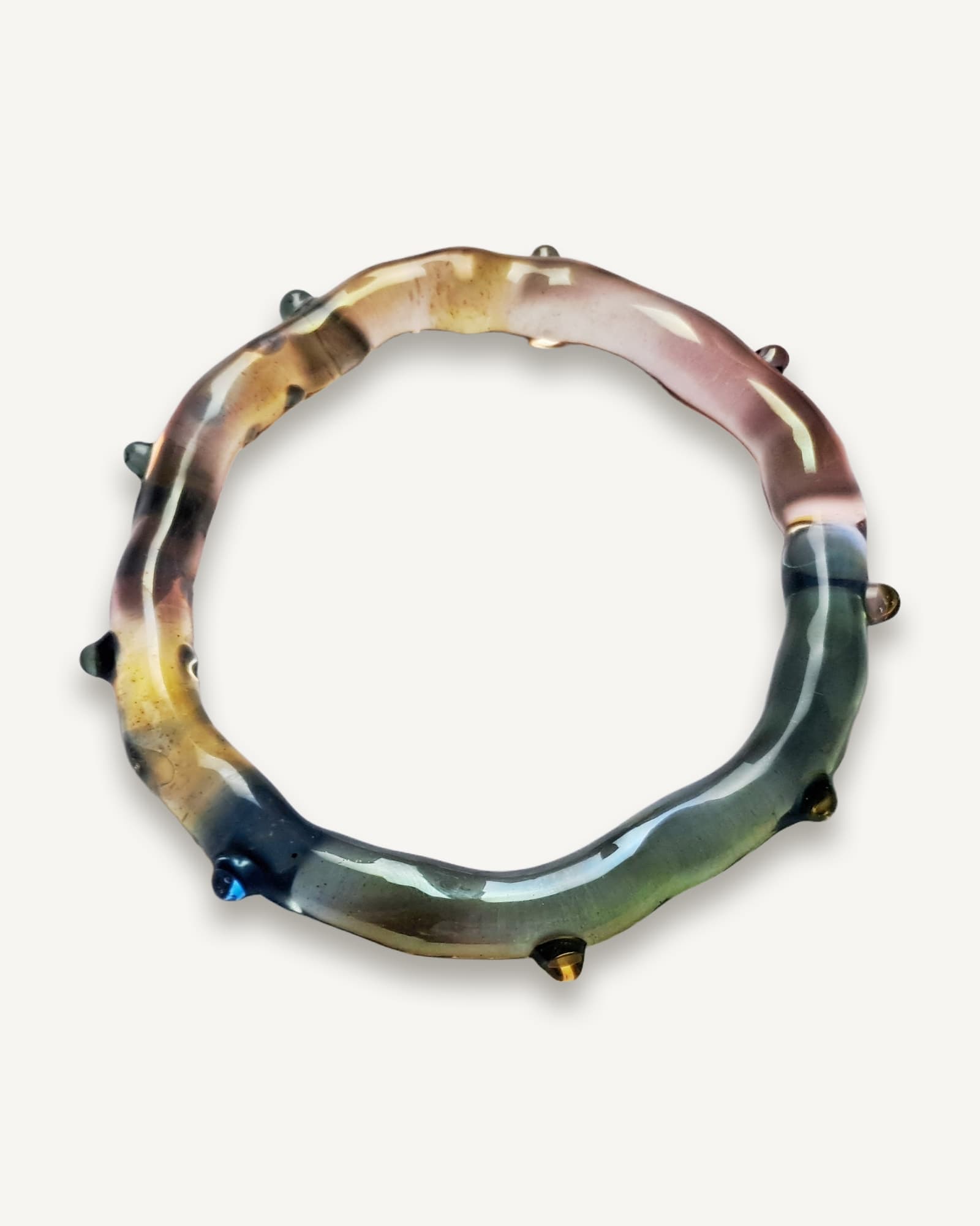 Arlekinos glass bangle in amber, pink and blue-green with raised glass dots