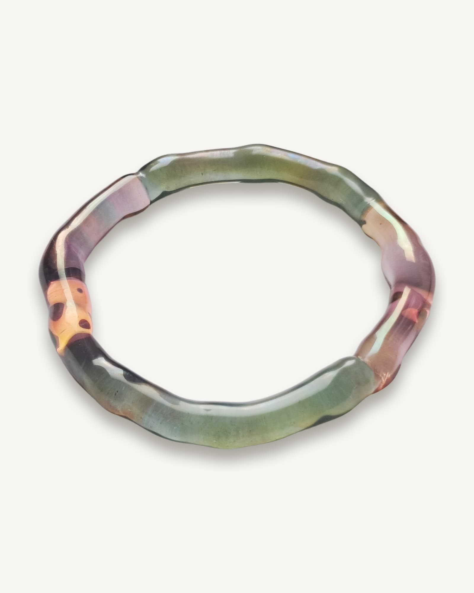 Glass bangle in green, pink and amber sections, inspired by Romano-British bangles