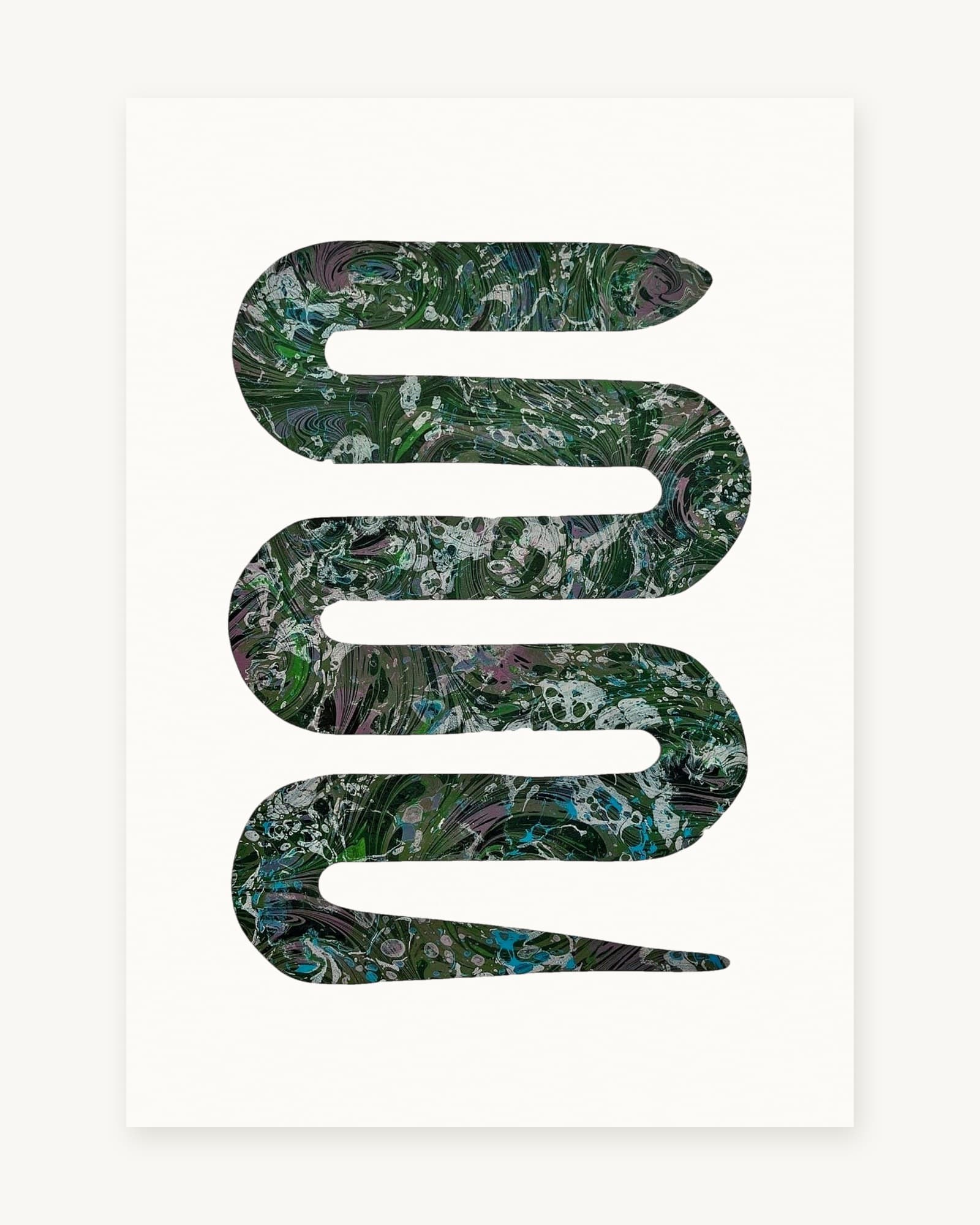 Hand-cut paper serpent in S-shape with marbled surface of swirling green, white, purple and blue patterns, mounted on white