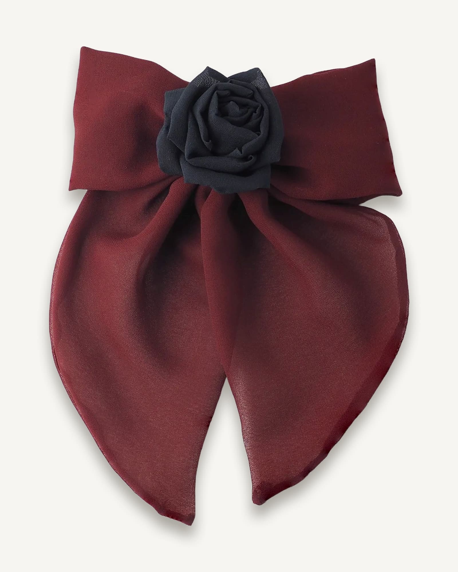 Handmade maroon chiffon bow hair clip featuring a large, elegant bow with soft flowing tails and adorned with a black silk rose at the center. Perfect for gothic and romantic styles