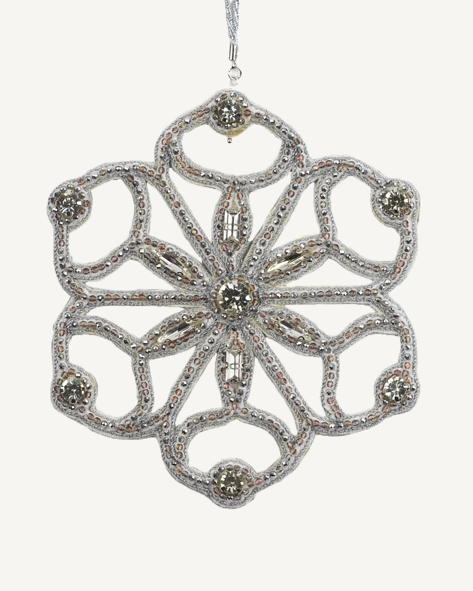 Close-up of the Jewels of Winter Six-Pointed Cut-Out Snowflake Ornament by Ksenia Semirova. Hand-embroidered with the pearl-setting technique using silver fire-polished glass beads and crystals, finished with a white leather back and silver hanging cord