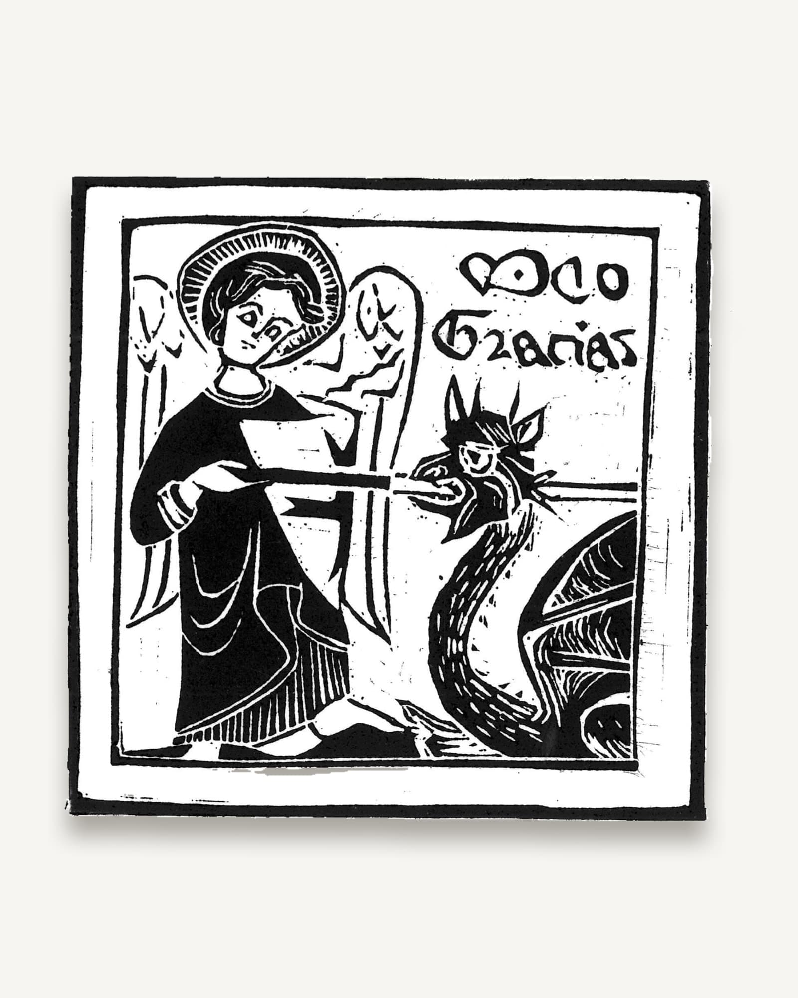 Black and white woodcut print depicting St Michael with halo and wings spearing a horned demon
