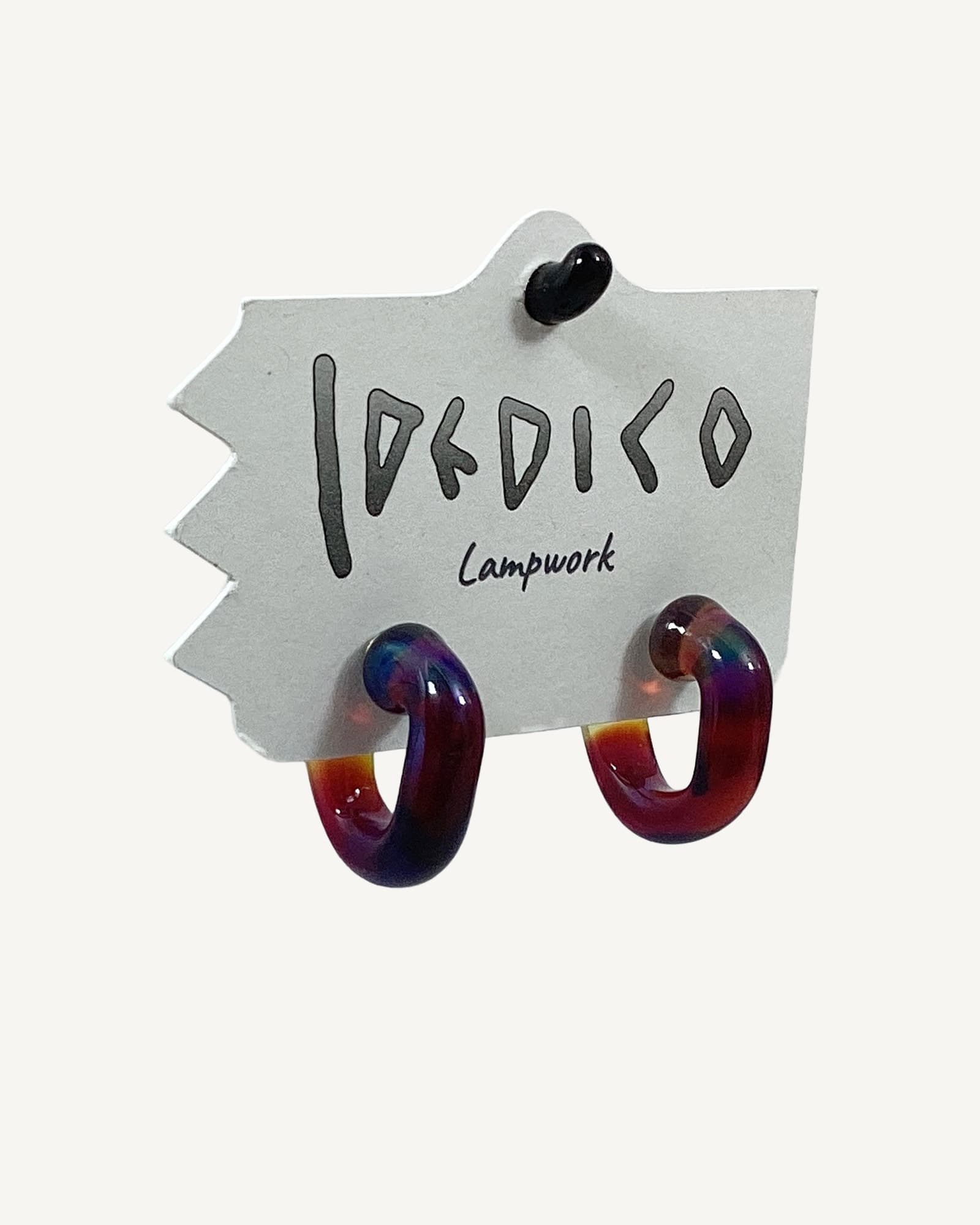 Ember glass earrings on an I Dedico lampwork card