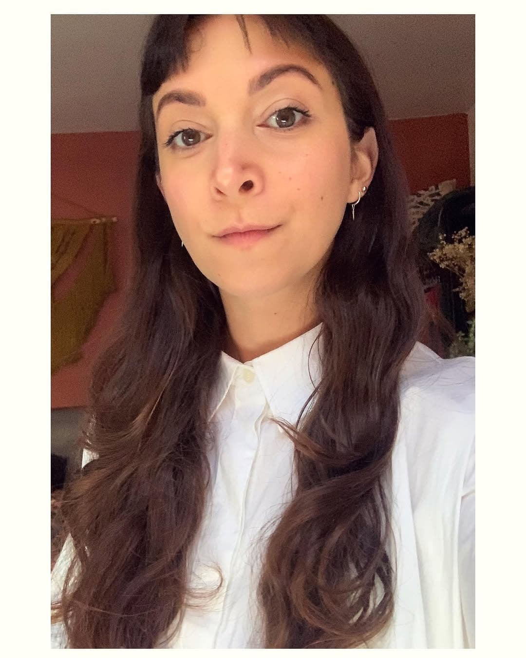 Annie Rose Edwards, head and shoulders, in a white shirt.